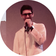 Kyle beatboxing into a microphone